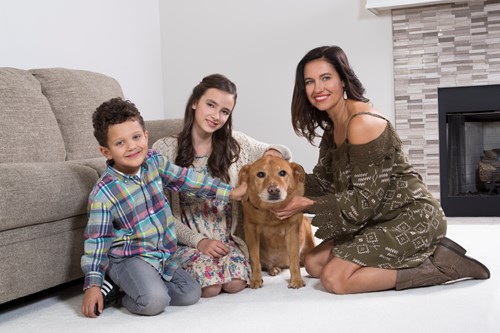 family on carpet in Stockton CA